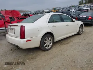 2005 Cadillac STS z VIN 1G6DW677250198015, wystawiony jako IAAI lot #41543304 z przebiegiem 160 000 mil mil oraz . Historia ofert i sprzedaży dostępna na DreamBid. Obrazek 4.