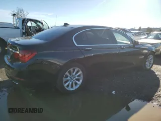 2015 BMW 7 Series 740Li with VIN WBAYE4C55FD947214, listed as a Copart auction lot 87261354 with 393,256 mi miles and Salvage Title. Bid and sale history available at DreamBid. Image 3.