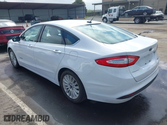 2016 Ford Fusion SE Hybrid with VIN 3FA6P0LU7GR397310, listed as a IAAI auction lot 42075891 with 124,879 mi miles. Bid and sale history available at carsss.com. Image 3.
