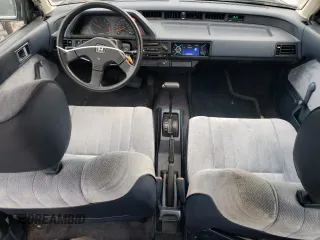 1987 Honda Civic z VIN 1HGEC4638HA016153, wystawiony jako Copart lot #73868274 z przebiegiem 22 876 mil mil oraz Tytuł czysty. Historia ofert i sprzedaży dostępna na DreamBid. Obrazek 8.