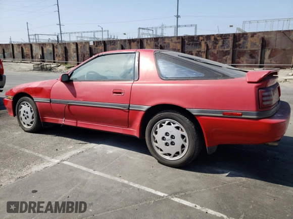 1989 Toyota Supra z VIN JT2MA70J3K0114537, wystawiony jako Copart lot #72587854 z przebiegiem 189 813 mil mil oraz Czysty tytuł • Clean title. Historia ofert i sprzedaży dostępna na DreamBid. Obrazek 2.