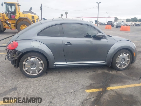 2013 Volkswagen Beetle 2.5L with VIN 3VWJP7AT6DM667477, listed as a IAAI auction lot 42215545 with 87,392 mi miles and . Bid and sale history available at DreamBid. Image 13.