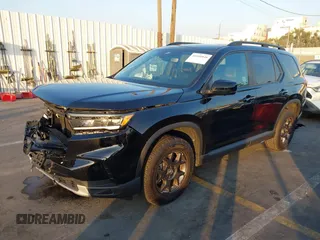 2023 Honda Pilot TrailSport with VIN 5FNYG1H60PB023366, listed as a IAAI auction lot 41040848 with 16,051 mi miles. Bid and sale history available at carsss.com. Image 17.