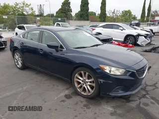 2016 Mazda 6 i Touring z VIN JM1GJ1V50G1401865, wystawiony jako IAAI lot #42334286 z przebiegiem 148 593 mil mil oraz . Historia ofert i sprzedaży dostępna na DreamBid. Obrazek 1.