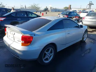 2000 Toyota Celica GTS with VIN JTDDY32T4Y0031461, listed as a IAAI auction lot 41405988 with 193,052 mi miles. Bid and sale history available at carsss.com. Image 4.