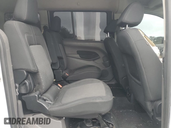 2019 Ford Transit Connect XLT with VIN NM0GS9F22K1427258, listed as a Copart auction lot 63234484 with 96,439 mi miles and Salvage title. Bid and sale history available at DreamBid. Image 11.