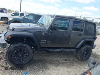 2017 Jeep Wrangler Unlimited Sport with VIN 1C4BJWDG6HL517779, listed as a IAAI auction lot 42134534 with 128,701 mi miles and . Bid and sale history available at DreamBid. Image 13.