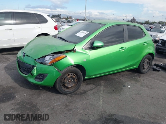 2012 Mazda 2 Sport with VIN JM1DE1KZ4C0140559, listed as a IAAI auction lot 41265959 with 139,364 mi miles and . Bid and sale history available at DreamBid. Image 2.