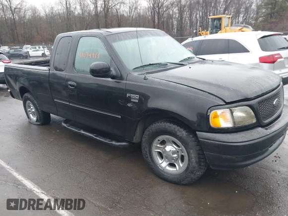 2002 Ford F-150 XL with VIN 1FTRX17W92NA80214, listed as a IAAI auction lot 41074951 with 164,048 mi miles. Bid and sale history available at carsss.com. Image 1.