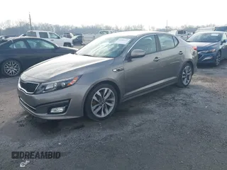 2014 Kia Optima SX Turbo with VIN 5XXGR4A64EG286133, listed as a IAAI auction lot 41489575 with 68,573 mi miles and . Bid and sale history available at DreamBid. Image 2.