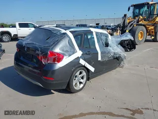 2014 BMW X1 sDrive28i with VIN WBAVM1C53EVW48026, listed as a IAAI auction lot 41714732 with 1 mi miles. Bid and sale history available at carsss.com. Image 4.