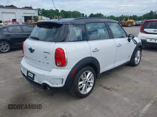 2014 MINI Countryman S z VIN WMWZC5C57EWP38396, wystawiony jako IAAI lot #42400771 z przebiegiem 147 302 mil mil oraz . Historia ofert i sprzedaży dostępna na DreamBid. Obrazek 4.