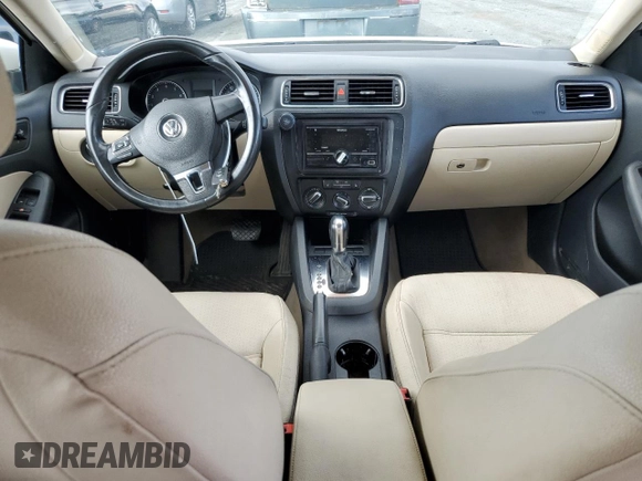 2012 Volkswagen Jetta SE with VIN 3VWDP7AJ4CM335256, listed as a Copart auction lot 57080145 with 228,239 mi miles and Salvage title. Bid and sale history available at DreamBid. Image 8.