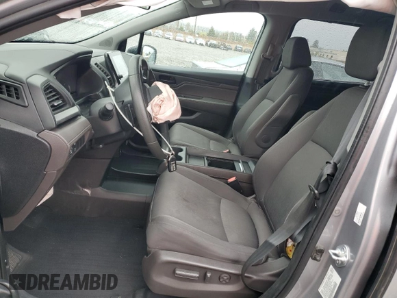 2022 Honda Odyssey EX with VIN 5FNRL6H57NB004556, listed as a Copart auction lot 49288215 with 128,460 mi miles and Salvage Title. Bid and sale history available at DreamBid. Image 7.