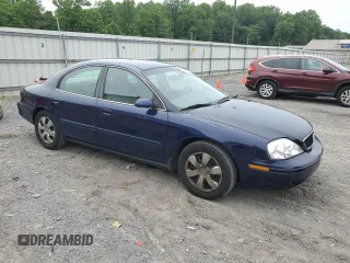 2003 Mercury Sable GS z VIN 1MEFM50U83G602556, wystawiony jako Copart lot #61019515 z przebiegiem 94 998 mil mil oraz Czysty tytuł • Clean title. Historia ofert i sprzedaży dostępna na DreamBid. Obrazek 4.