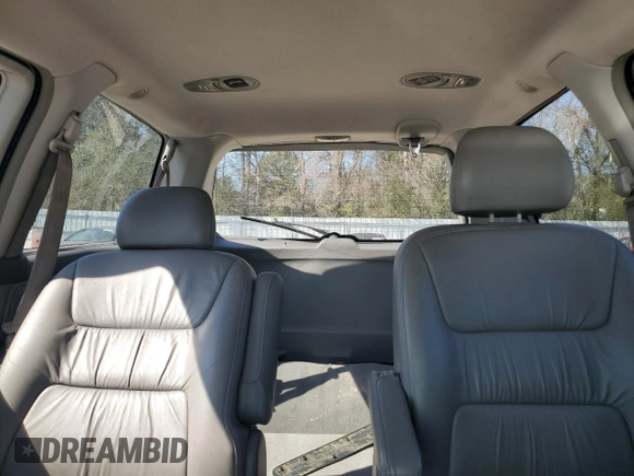 2004 Honda Odyssey EX-L with VIN 5FNRL18974B074613, listed as a Copart auction lot 48924865 with 212,633 mi miles and Salvage Title. Bid and sale history available at DreamBid. Image 10.