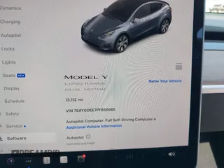 2023 Tesla Model Y Long Range with VIN 7SAYGDEE7PF856985, listed as a IAAI auction lot 42097675 with 13,112 mi miles and . Bid and sale history available at DreamBid. Image 7.