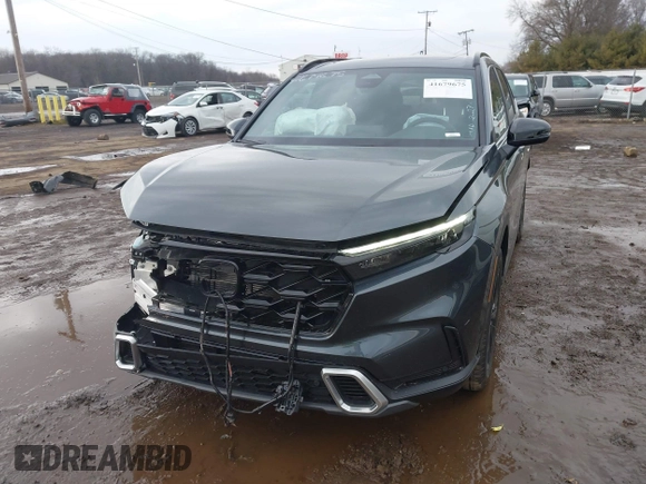 2025 Honda CR-V Sport Touring with VIN 7FARS6H93SE043232, listed as a IAAI auction lot 41679675 with 11,641 mi miles and . Bid and sale history available at DreamBid. Image 2.