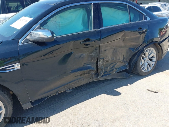 2015 Ford Taurus Limited with VIN 1FAHP2F81FG104493, listed as a IAAI auction lot 42587708 with 152,825 mi miles and . Bid and sale history available at DreamBid. Image 6.