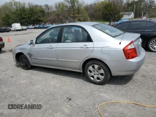 2004 Kia Spectra LX with VIN KNAFE121245031019, listed as a Copart auction lot 52960135 with 183,016 mi miles and Salvage Title. Bid and sale history available at carsss.com. Image 2.
