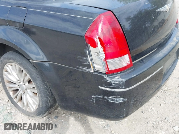 2006 Chrysler 300 Touring with VIN 2C3KA53G36H220558, listed as a IAAI auction lot 42159373 with 158,970 mi miles. Bid and sale history available at carsss.com. Image 6.
