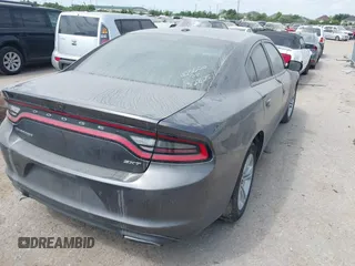 2018 Dodge Charger SXT with VIN 2C3CDXBGXJH180271, listed as a IAAI auction lot 42071701 with 129,325 mi miles and . Bid and sale history available at DreamBid. Image 4.