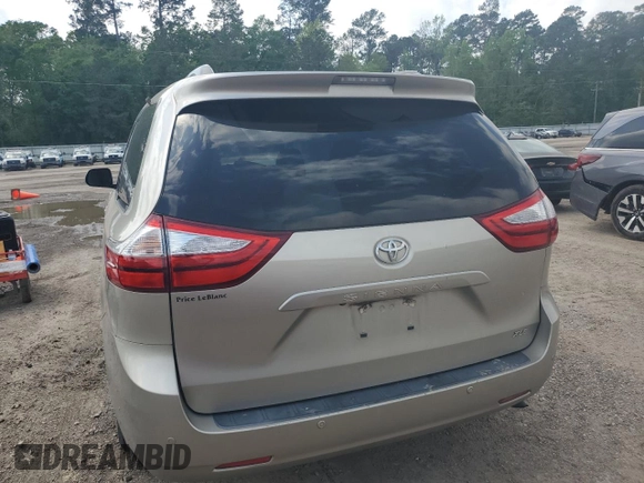 2016 Toyota Sienna XLE with VIN 5TDYK3DC0GS697468, listed as a Copart auction lot 51186795 with 128,851 mi miles and Salvage Title. Bid and sale history available at DreamBid. Image 6.
