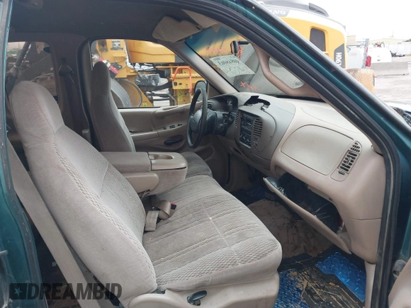 1997 Ford F-150 XL with VIN 1FTEX17LXVNC32588, listed as a IAAI auction lot 40848063 with 210,113 mi miles and . Bid and sale history available at DreamBid. Image 5.