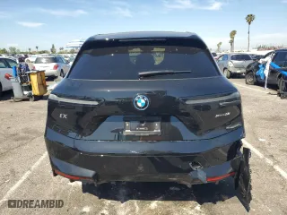 2025 BMW iX xDrive50 with VIN WB523CF05SCT96190, listed as a Copart auction lot 52585415 with 1,894 mi miles and Salvage Title. Bid and sale history available at carsss.com. Image 6.