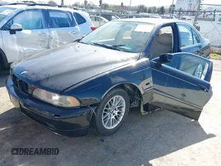 2003 BMW 5 Series 530iA with VIN WBADT63493CK37063, listed as a IAAI auction lot 41637589 with 179,191 mi miles. Bid and sale history available at carsss.com. Image 2.