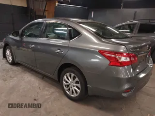 2019 Nissan Sentra S z VIN 3N1AB7AP3KY368736, wystawiony jako IAAI lot #42283123 z przebiegiem 89 117 mil mil oraz . Historia ofert i sprzedaży dostępna na DreamBid. Obrazek 3.