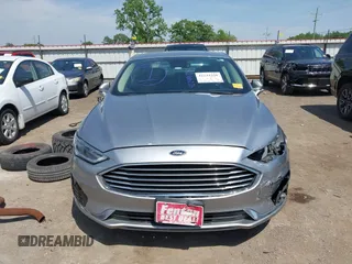 2020 Ford Fusion SEL with VIN 3FA6P0CDXLR196124, listed as a IAAI auction lot 42244231 with 99,306 mi miles and . Bid and sale history available at DreamBid. Image 13.