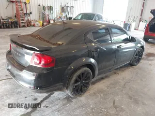 2013 Dodge Avenger SXT with VIN 1C3CDZCGXDN682929, listed as a IAAI auction lot 42689835 with 218,798 mi miles and . Bid and sale history available at DreamBid. Image 4.