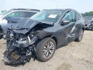 2022 Ford Escape Titanium with VIN 1FMCU9J91NUB87215, listed as a IAAI auction lot 42092928 with 3,255 mi miles and . Bid and sale history available at DreamBid. Image 2.