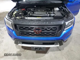 2024 Nissan Frontier SV z VIN 1N6ED1EK5RN615750, wystawiony jako Copart lot #54297595 z przebiegiem 7028 mil mil oraz Szkody całkowita. Historia ofert i sprzedaży dostępna na DreamBid. Obrazek 11.