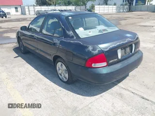 2003 Nissan Sentra XE with VIN 3N1CB51D83L813375, listed as a IAAI auction lot 42090865 with 125,492 mi miles and . Bid and sale history available at DreamBid. Image 3.