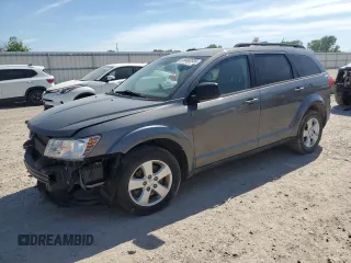 2013 Dodge Journey American Value z VIN 3C4PDCAB3DT517712, wystawiony jako Copart lot #56602035 z przebiegiem 193 129 mil mil oraz Czysty tytuł • Clean title. Historia ofert i sprzedaży dostępna na DreamBid. Obrazek 1.