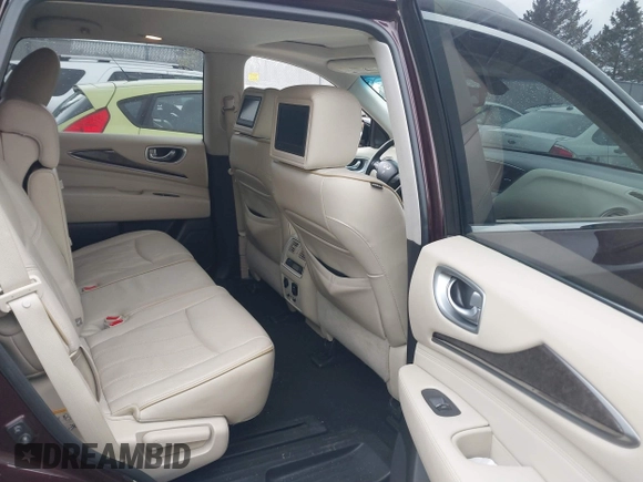 2015 Infiniti QX60 with VIN 5N1AL0MM8FC521835, listed as a IAAI auction lot 41684258 with 100,266 mi miles. Bid and sale history available at carsss.com. Image 8.