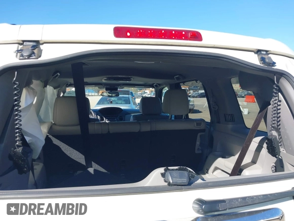 2015 Honda Pilot Touring with VIN 5FNYF3H97FB023842, listed as a IAAI auction lot 41673881 with 106,110 mi miles. Bid and sale history available at carsss.com. Image 17.