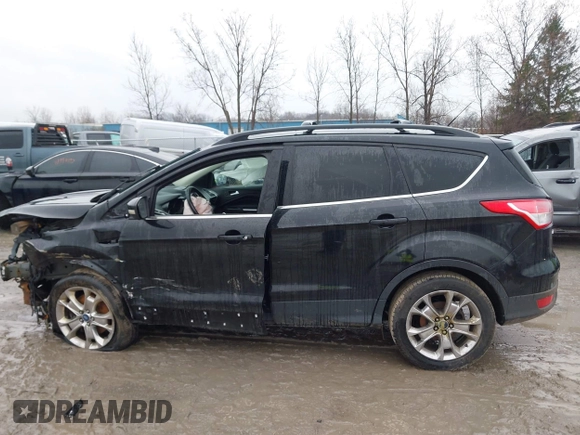 2013 Ford Escape SEL with VIN 1FMCU9H90DUA77972, listed as a IAAI auction lot 41984889 with 206,265 mi miles. Bid and sale history available at carsss.com. Image 14.