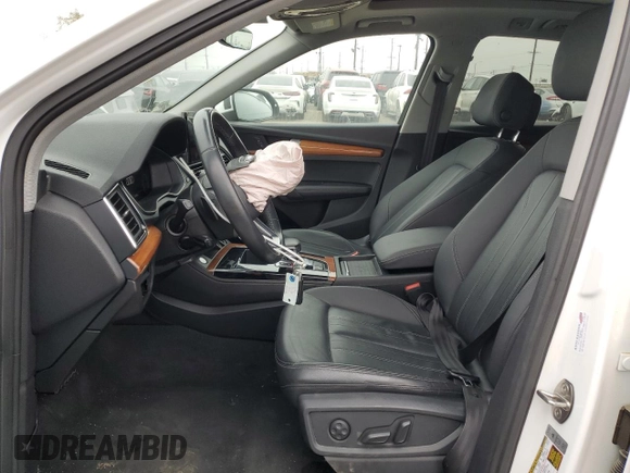 2021 Audi Q5 Premium Plus with VIN WA1BAAFY4M2021995, listed as a Copart auction lot 55136145 with 84,553 mi miles and Salvage Title. Bid and sale history available at carsss.com. Image 7.