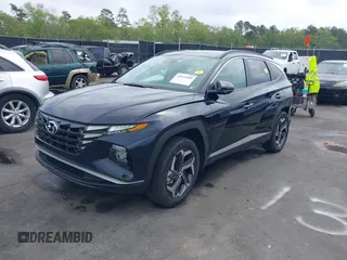 2022 Hyundai Tucson SEL Convenience with VIN KM8JFCA10NU049450, listed as a IAAI auction lot 41915300 with 23,584 mi miles and . Bid and sale history available at carsss.com. Image 2.