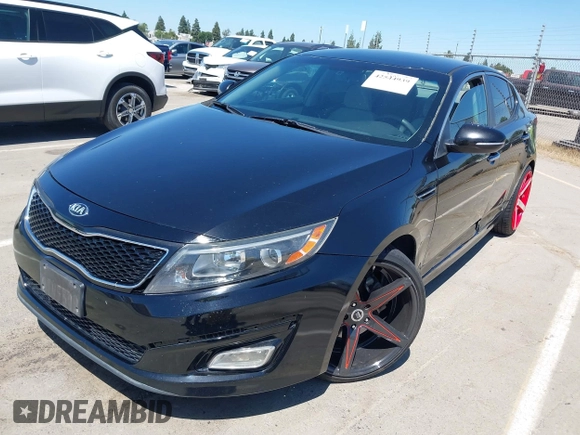 2015 Kia Optima LX z VIN 5XXGM4A76FG507580, wystawiony jako IAAI lot #42544939 z przebiegiem 99 804 mil mil oraz . Historia ofert i sprzedaży dostępna na DreamBid. Obrazek 2.