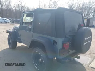 1997 Jeep Wrangler SE with VIN 1J4FY29P0VP522005, listed as a IAAI auction lot 41895863 with 196,614 mi miles. Bid and sale history available at carsss.com. Image 3.
