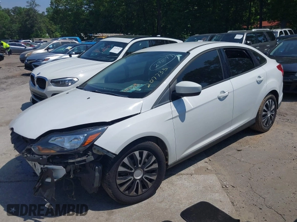 2012 Ford Focus SE with VIN 1FAHP3F24CL207735, listed as a IAAI auction lot 42131828 with 170,044 mi miles and . Bid and sale history available at DreamBid. Image 2.