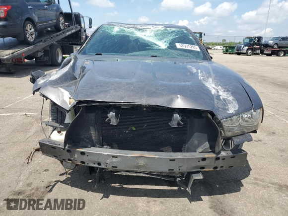 2013 Dodge Charger SE z VIN 2C3CDXBG5DH638254, wystawiony jako Copart lot #58925295 z przebiegiem 201 802 mil mil oraz Szkoda całkowita • Salvage title. Historia ofert i sprzedaży dostępna na DreamBid. Obrazek 5.