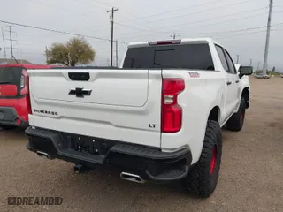 2024 Chevrolet Silverado 1500 LT Trail Boss with VIN 3GCUDFE81RG231196, listed as a IAAI auction lot 41242013 with 14,747 mi miles. Bid and sale history available at carsss.com. Image 4.