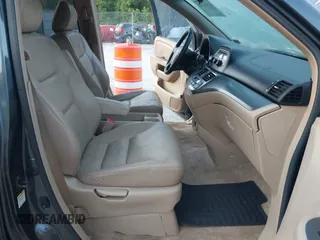 2005 Honda Odyssey EX-L with VIN 5FNRL38605B406281, listed as a IAAI auction lot 42582488 with 185,862 mi miles and . Bid and sale history available at DreamBid. Image 5.