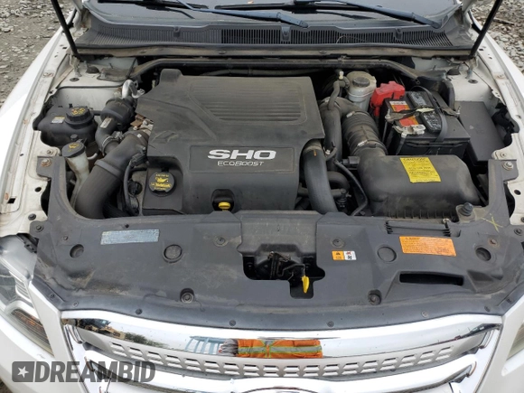 2012 Ford Taurus SHO with VIN 1FAHP2KT2CG141879, listed as a Copart auction lot 56558365 with 105,230 mi miles and Salvage title. Bid and sale history available at DreamBid. Image 11.