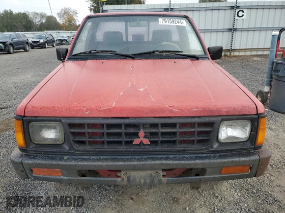 1991 Mitsubishi Mighty Max z VIN JA7FL24W2MP026041, wystawiony jako Copart lot #79159244 z przebiegiem 219 903 mil mil oraz Szkoda całkowita • Salvage title. Historia ofert i sprzedaży dostępna na DreamBid. Obrazek 5.